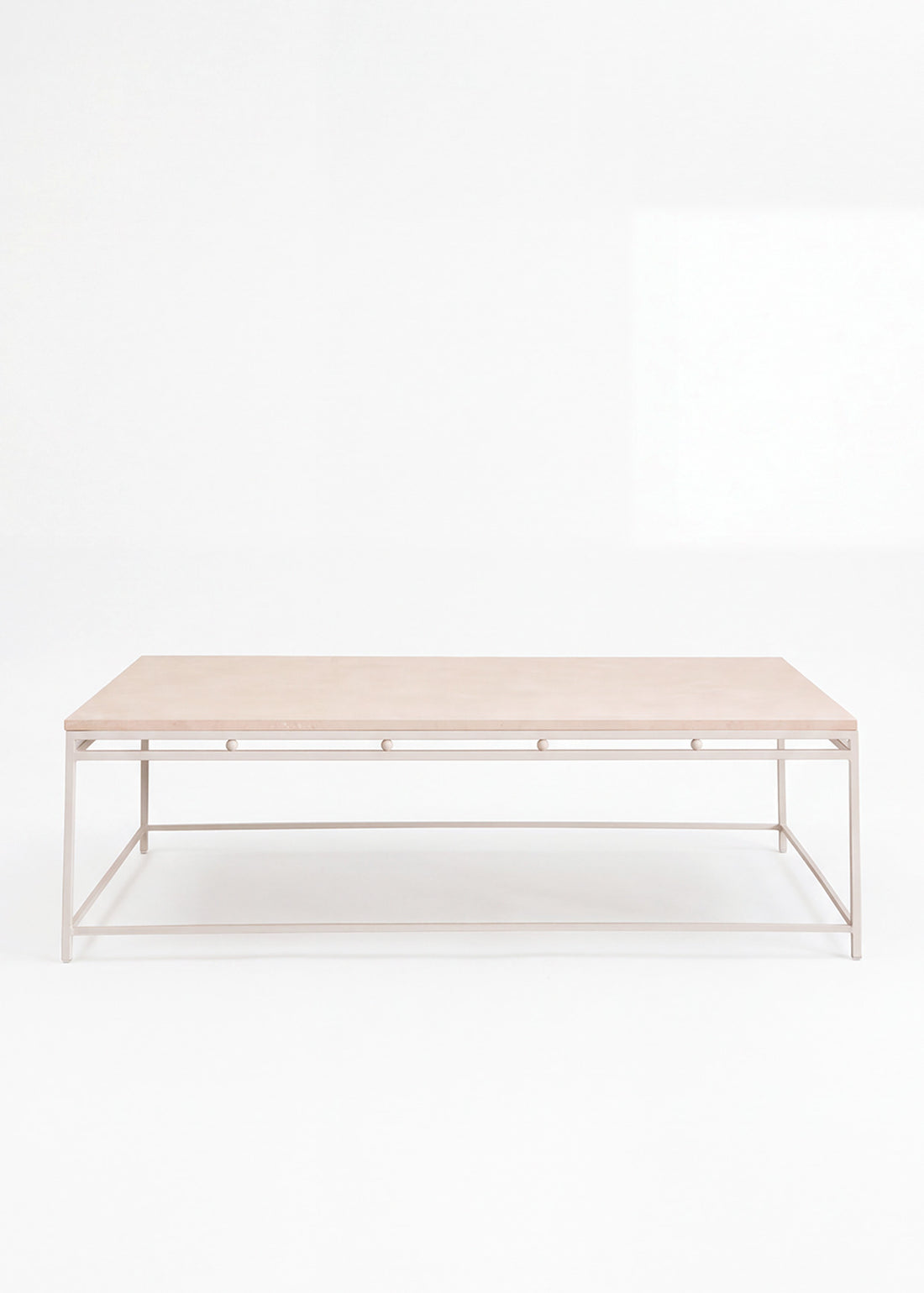 Iron and limestone coffee table