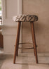 Taburete tapizado con estructura de madera