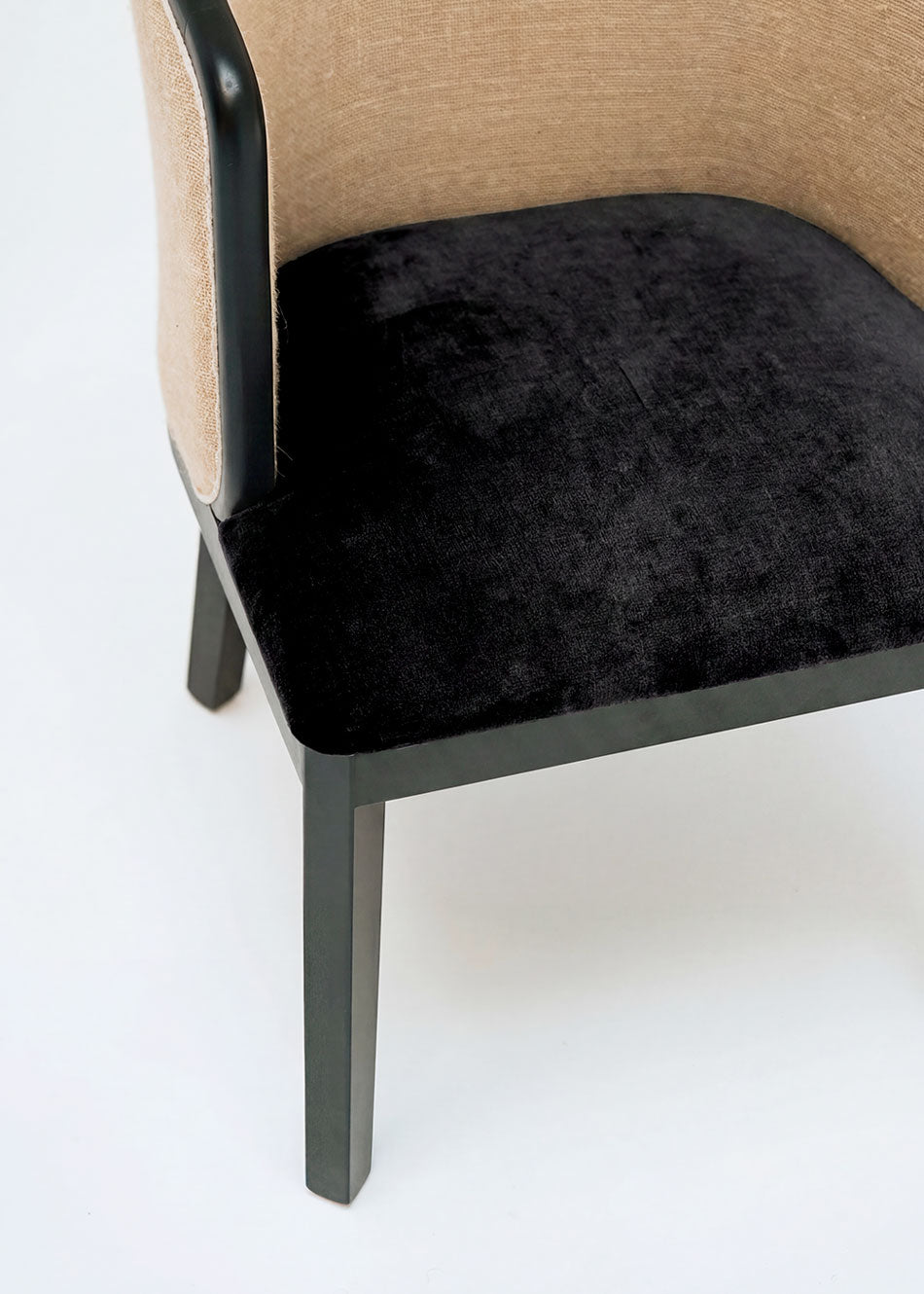 Braided rattan chair with black wood frame