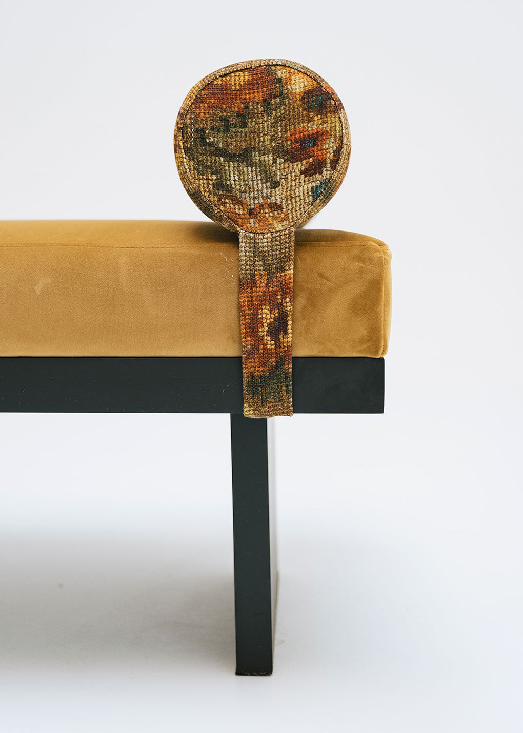 Mustard yellow bench with bolsters