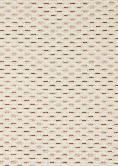 Cabecero tapizado en tela estampada.