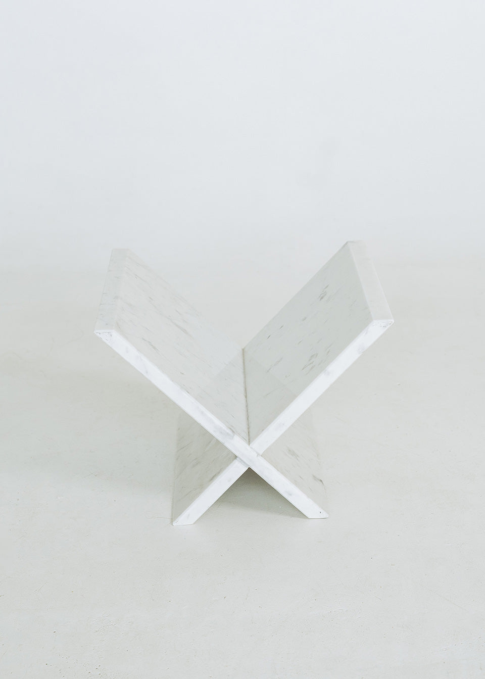 White marble magazine rack