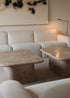 Mesa baja de centro de Travertino Olivillo apomazado con esquinas redondeadas.