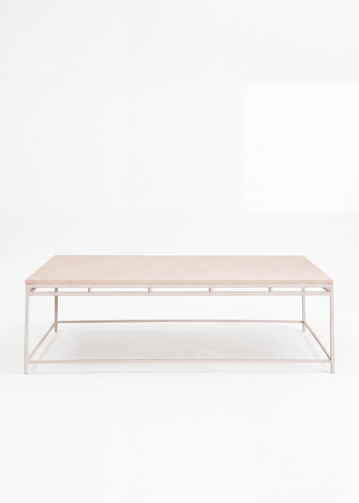 Iron and limestone coffee table