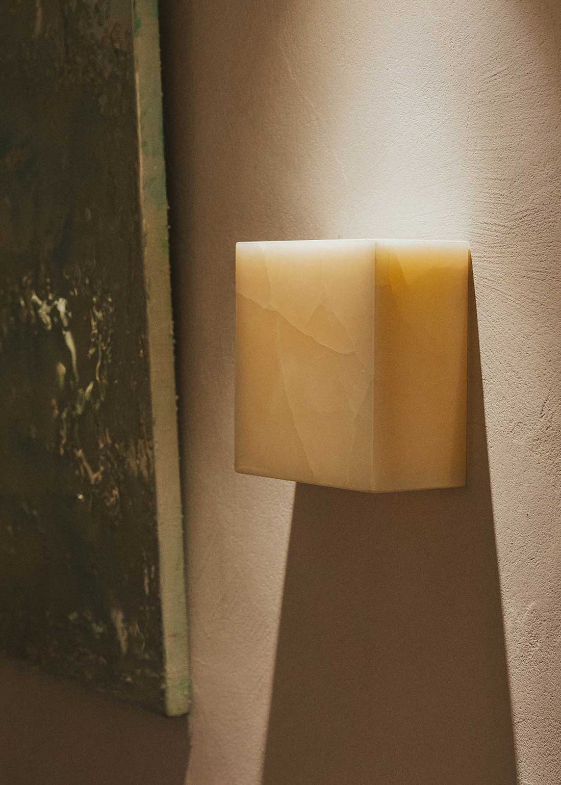 Aplique cuadrado de pared realizado en ónix.