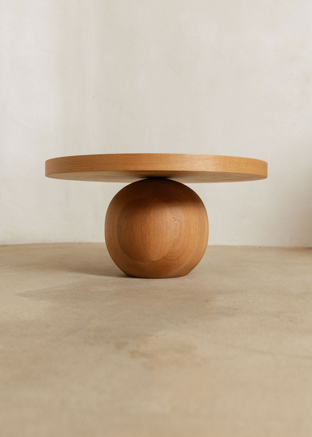 Wooden table on a sphere