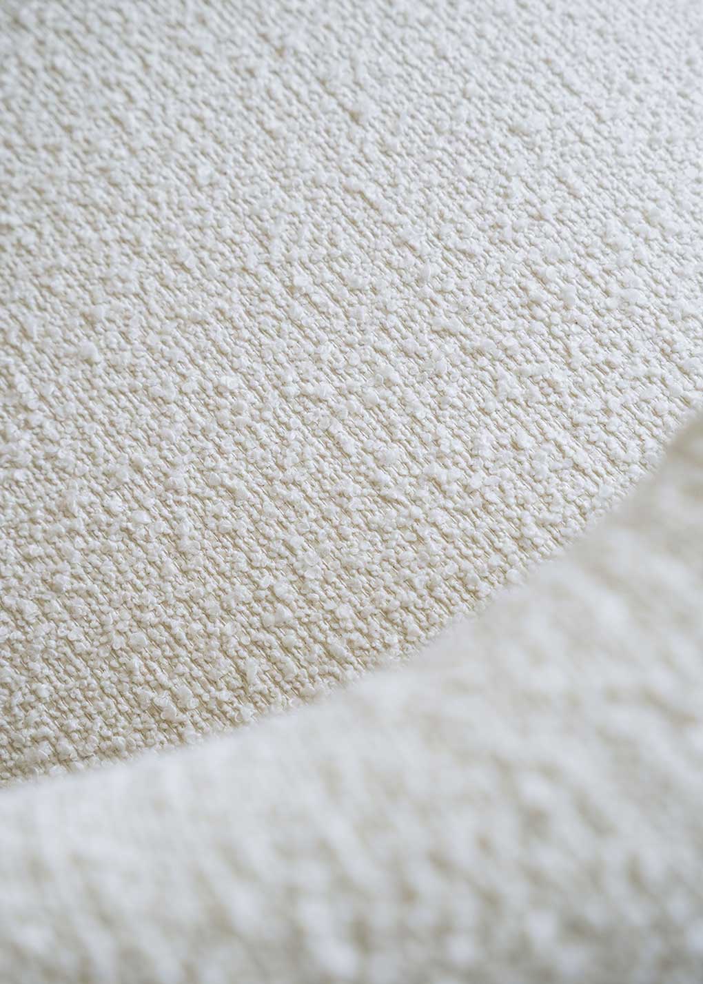 White bouclé armchair