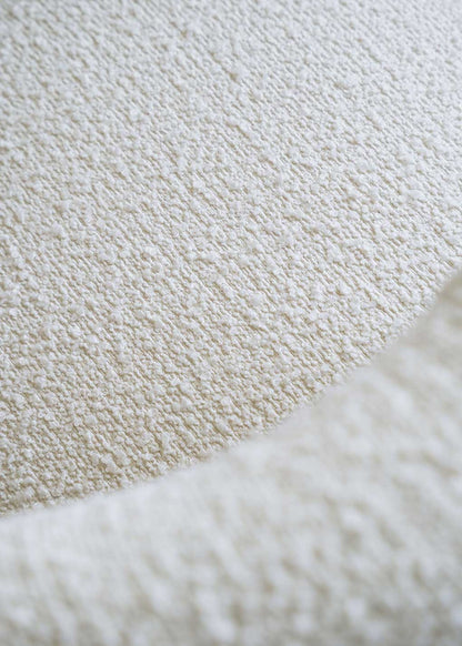 White bouclé armchair