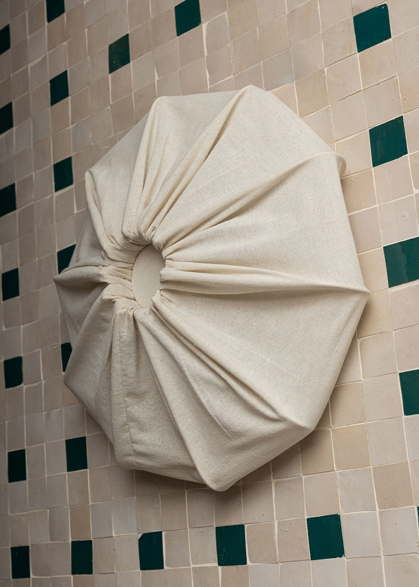 Aplique de pared de lino.