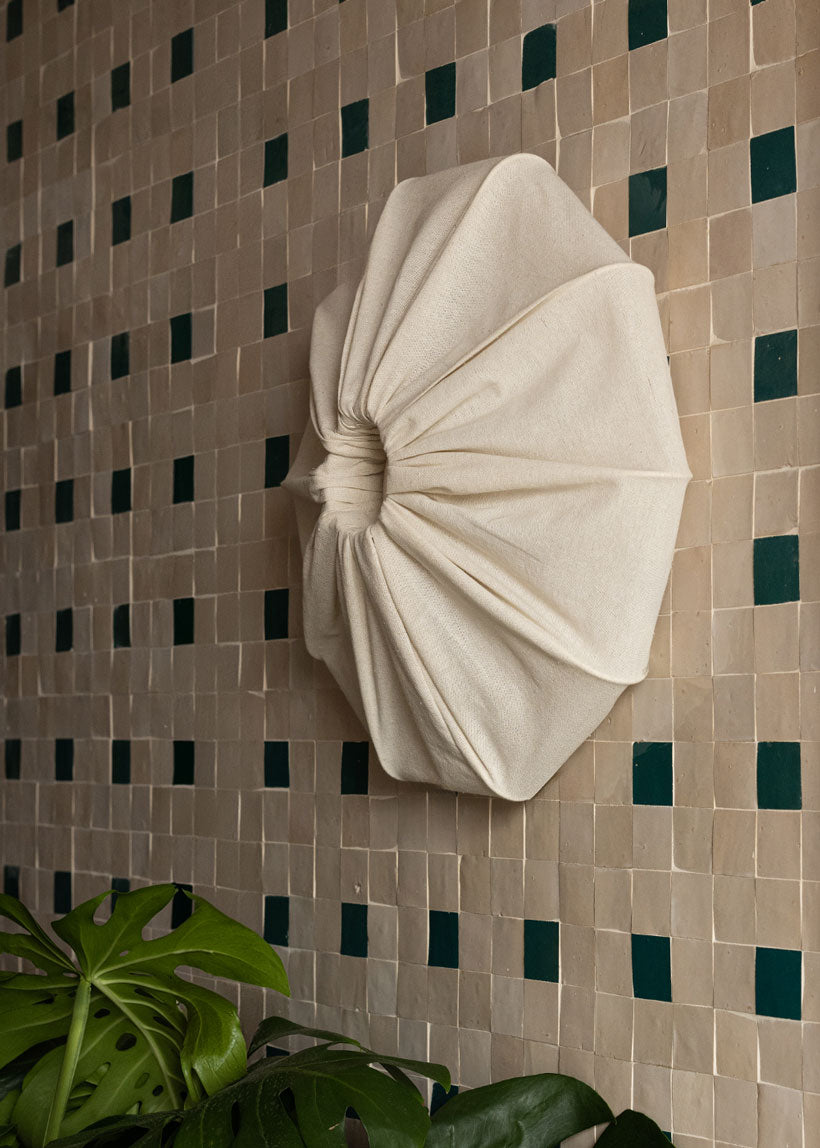 Aplique de pared de lino.