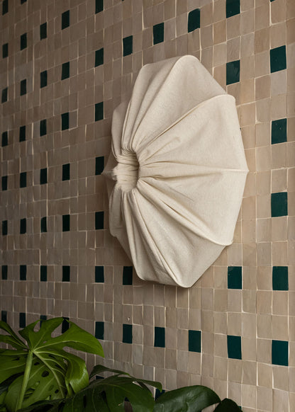 Aplique de pared de lino.