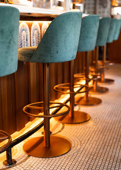 Tall green iron stool