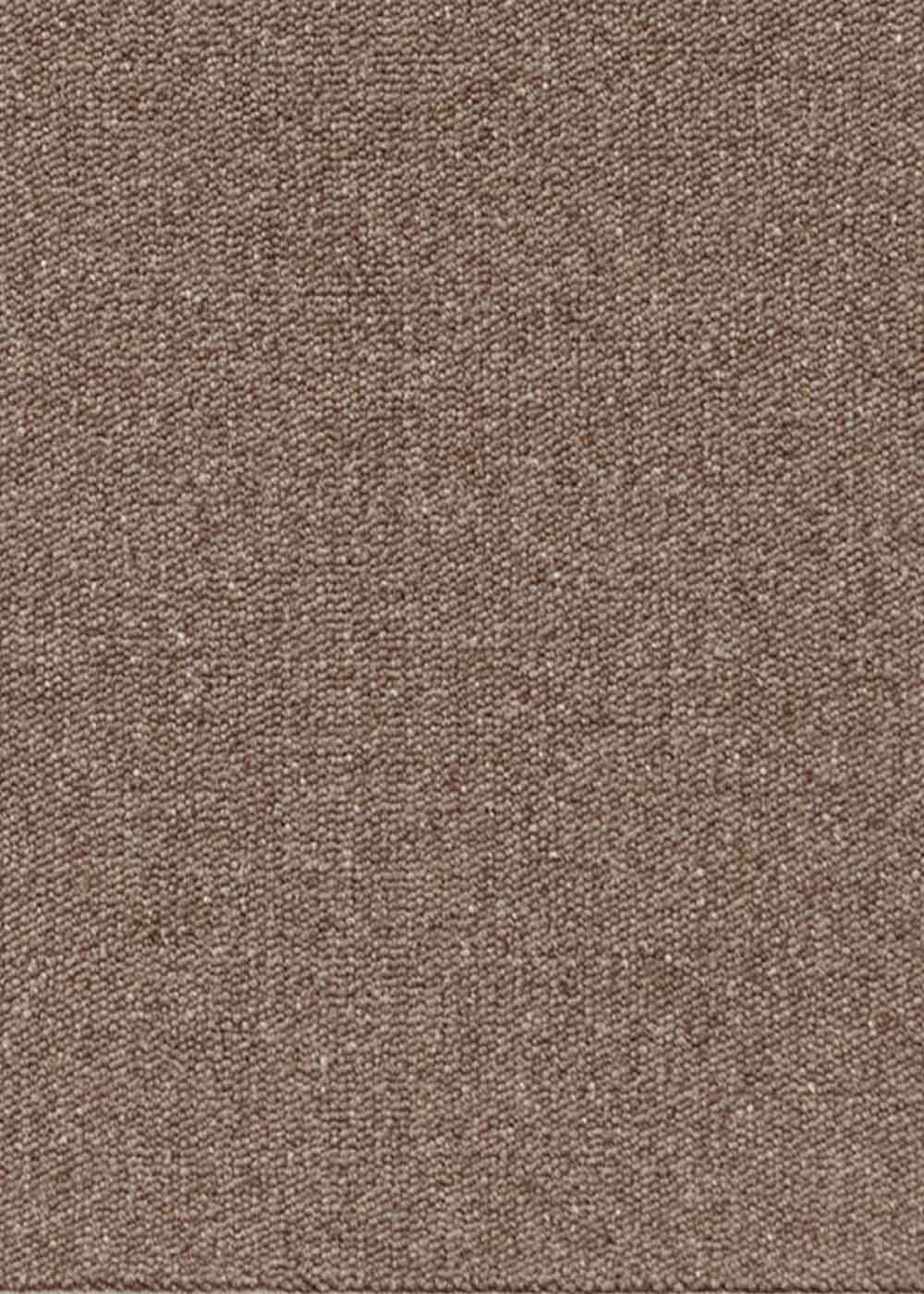 Alfombra fabricada con lana de color chocolate en telar tufting con superficie en bucle.