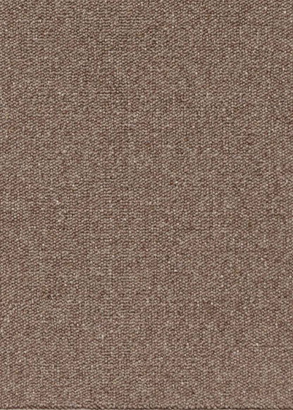 Alfombra fabricada con lana de color chocolate en telar tufting con superficie en bucle.