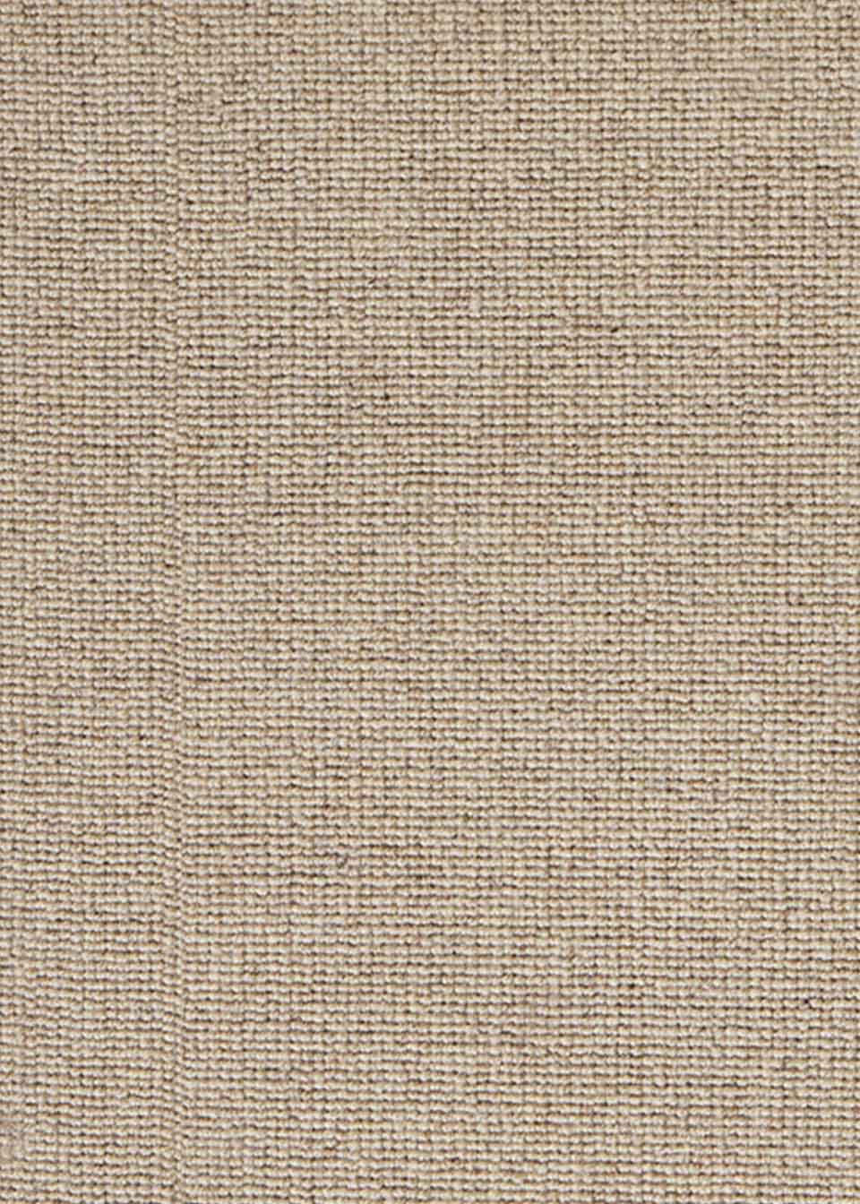 Alfombra fabricada con lana de color topo en telar tufting con superficie en bucle.