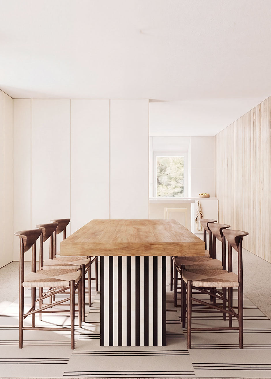 Mesa de comedor con pie de madera lacada a rayas