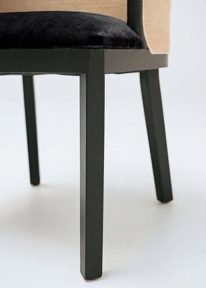 Braided rattan chair with black wood frame