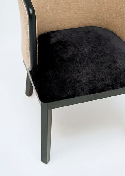 Braided rattan chair with black wood frame