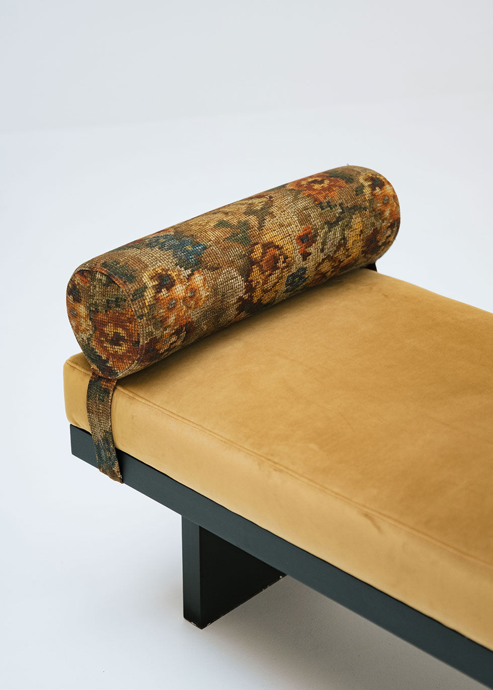 Mustard yellow bench with bolsters