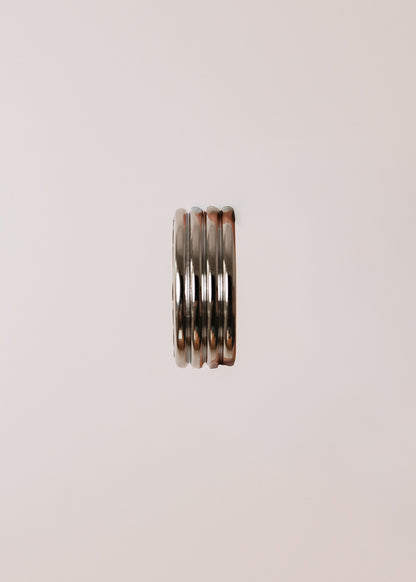 Round metal handle covered in bison leather