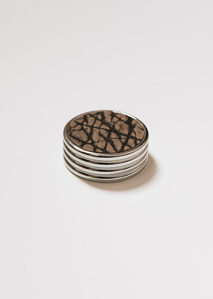 Round metal handle covered in bison leather